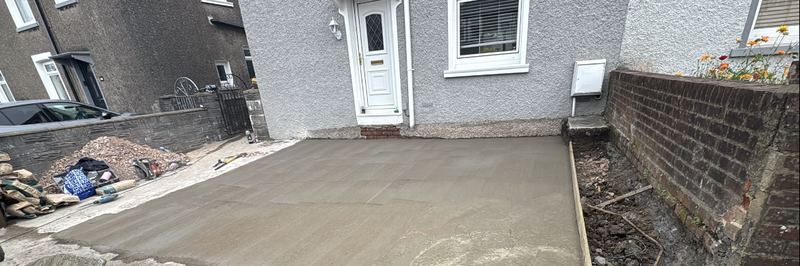 Freshly poured concrete driveway completed