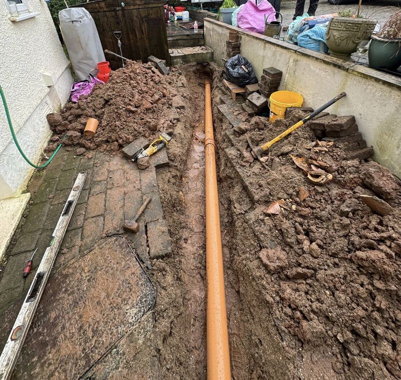 Drainage pipe laid in excavated trench