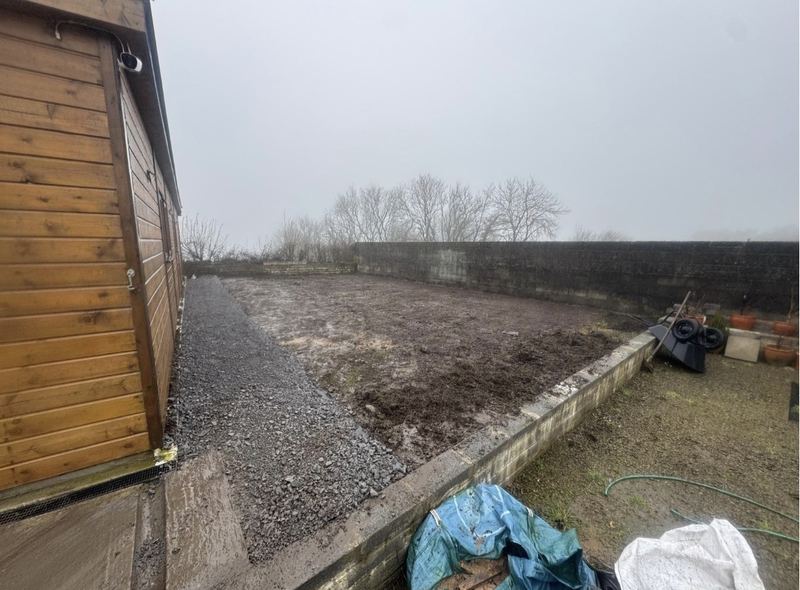 Cleared and levelled site after excavation