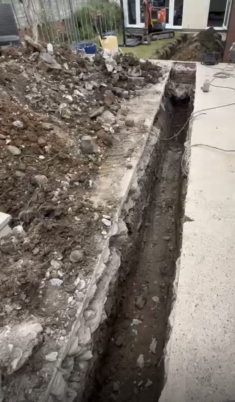 Trench excavation for manhole installation