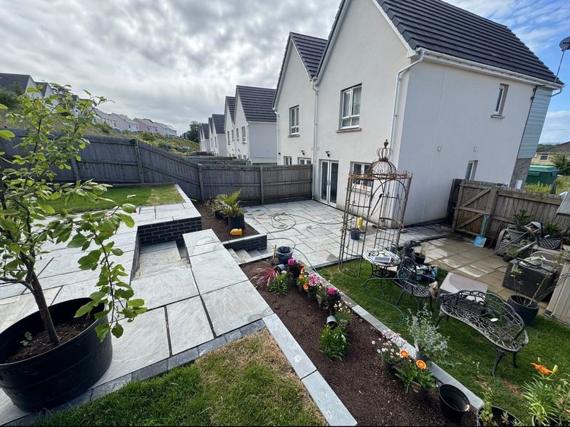 Finished garden with slate paving and landscaping
